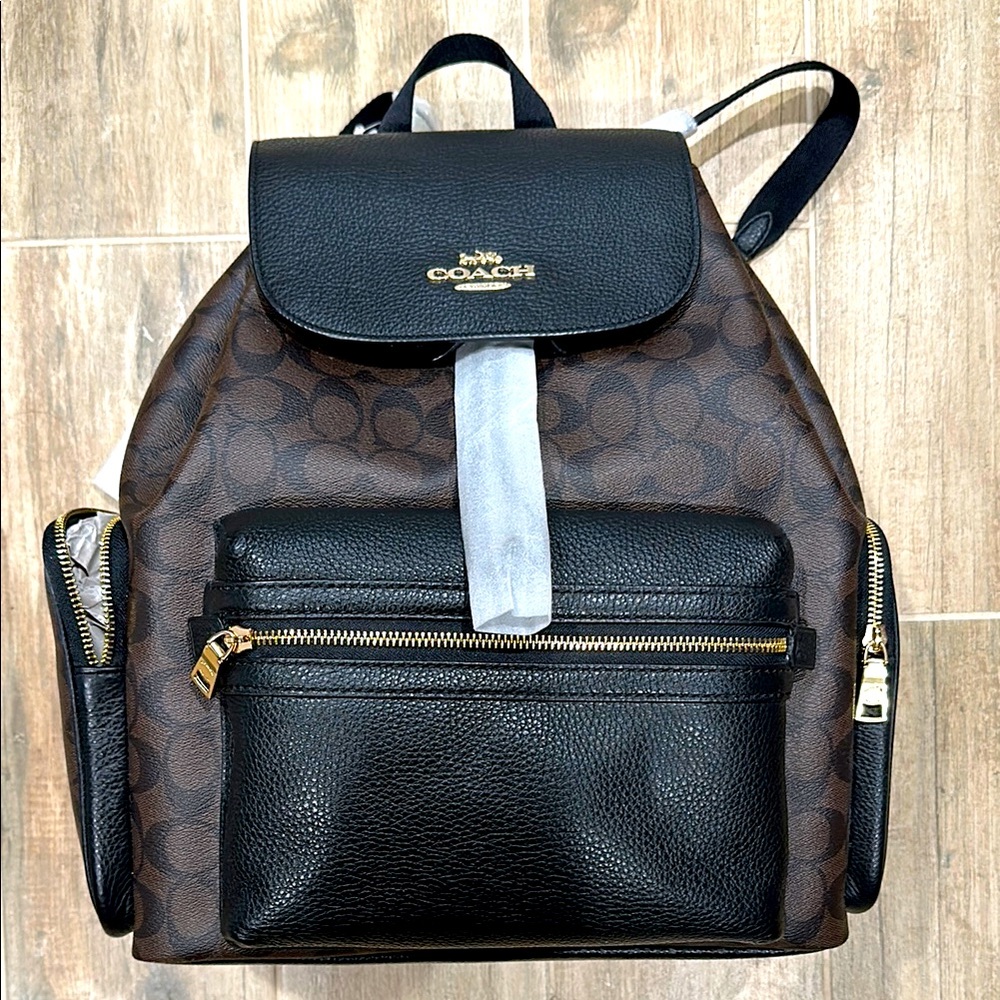 Coach Brown and Black Diaper Bag. Never used. Still has tags on it.
